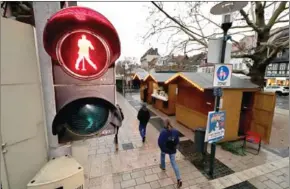  ?? AFP ?? A traffic light customised with a dancing Elvis Presley in Friedberg, Germany.