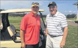  ?? SUBMITTED PHOTO ?? Paul Quinney, left, poses for a photo with NHL great Frank Mahovlich during a chance encounter at Andersons Creek Golf Club in Stanley Bridge, P.E.I.