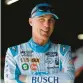  ?? SEAN GARDNER/GETTY ?? Kevin Harvick waits in the garage area during practice Friday in Madison, Illinois.