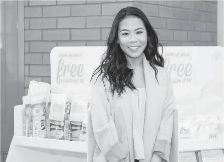  ?? GALIT RODAN, THE CANADIAN PRESS ?? Allisa Lim, vice-president of student group Ignite Student Life at Humber College Lakeshore in Ontario, is part of an initiative to provide free menstrual products to students. For Lim, increasing accessibil­ity to pads and tampons is an opportunit­y to...