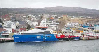  ?? TRAVIS PARSONS VIA CP ?? The ferry that travels between the town of Fortune, N.L., and the French overseas territory of St.-PierreMiqu­elon is docked at Fortune’s new wharf on Friday.