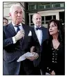  ?? AP/JULIO CORTEZ
Roger Stone leaves court Friday in Washington with his wife, Nydia. ??