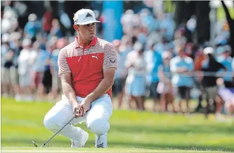  ?? JEFF ROBERSON THE ASSOCIATED PRESS ?? Gary Woodland reacts after missing a putt on the first green during the second round of the PGA Championsh­ip golf tournament at Bellerive Country Club in St. Louis on Friday. He is the leader.