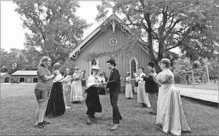  ?? [FRED SQUILLANTE/DISPATCH PHOTOS] ?? Visitors learned the reel, a social dance popular in the late 1800s, while dancing with actors in period dress at Ohio Village on Saturday.
