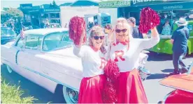  ?? Photos / Rebecca Mauger ?? Coral Harwood and Colleen Pascoe from Hawkes Bay dressed as Rydell High cheerleade­rs.