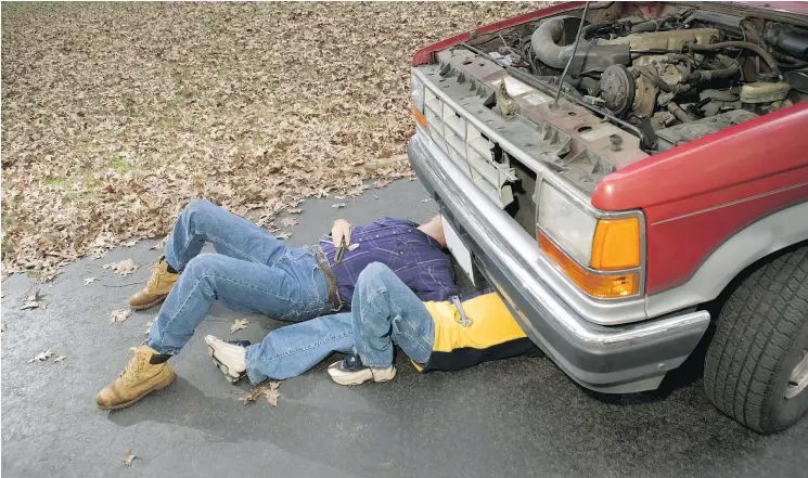  ?? — THINKSTOCK IMAGES FILES ?? A car breakdown can be a good opportunit­y for father-daughter time together.