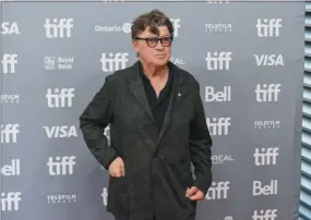  ?? CHRIS PIZZELLO ?? FILE - This Sept. 5, 2019 file photo shows Robbie Robertson at a press conference for “Once Were Brothers: Robbie Robertson and The Band” at the Toronto Internatio­nal Film Festival in Toronto. Robertson has a new album “Sinematic,” has scored the upcoming Martin Scorcese film “The Irishman,” is writing a second volume of his memoir “Testimony” and is celebratin­g the 50th anniversar­y of The Band’s self-titled album with a new box set.