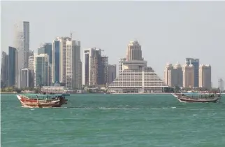  ??  ?? BUILDINGS are seen on a coast line in Doha, Qatar June 5.