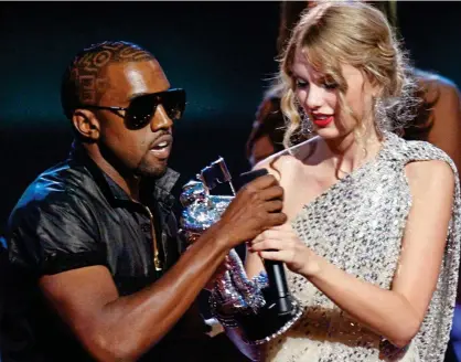  ?? ?? Spat: Kanye West takes the microphone from Taylor Swift at the 2009 MTV Video Music Awards