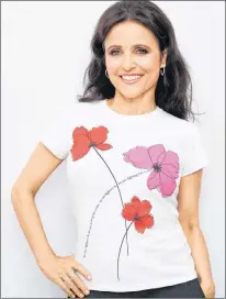 ??  ?? This undated image released by Saks Fifth Avenue shows actress Julia Louis-dreyfus, revealed last September that she had been diagnosed with breast cancer, in a flower-adorned T-shirt as part of Saks Fifth Avenue’s 20th year raising money through its Key to the Cure program.