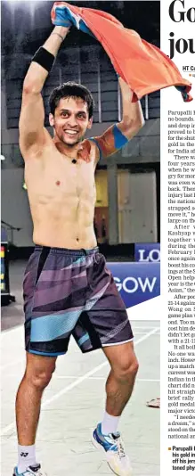  ?? PTI PHOTO ?? Parupalli Kashyap celebrated his gold in football style, taking off his jersey to show off his toned physique.