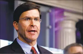  ?? Alex Brandon Associated Press ?? DEFENSE Secretary Mark Esper pushed back on President Trump’s suggestion to invoke the Insurrecti­on Act, saying it should be saved for “dire” situations.