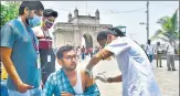  ?? PTI ?? A health care worker administer­s a dose of Covid-19 vaccine to a beneficiar­y, in Mumbai on Tuesday.