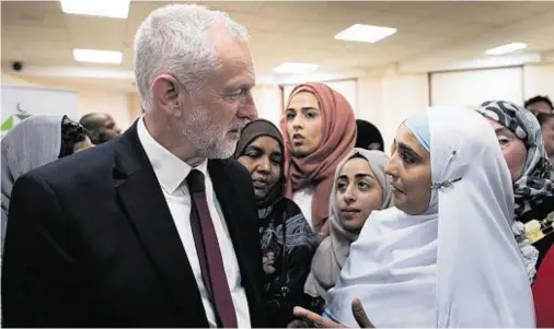  ??  ?? VISIT: Labour leader Jeremy Corbyn meets locals at Finsbury Park Mosque in north London after the latest violence in the capital