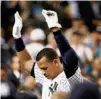  ?? Kathy Willens / Associated Press ?? Alex Rodriguez takes a curtain call after milestone.