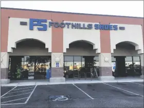  ?? PHOTOS BY MARA KNAU B/ YUMA SUN ?? FOOTHILLS SHOES HAS MORE THAN A NEW LOGO. The one-stop shop for quality footwear has moved next door into the former Snap Fitness space. It is now located in the much larger Suite C4, 11274 S. Fortuna Road, in the Pioneer Shopping Center.