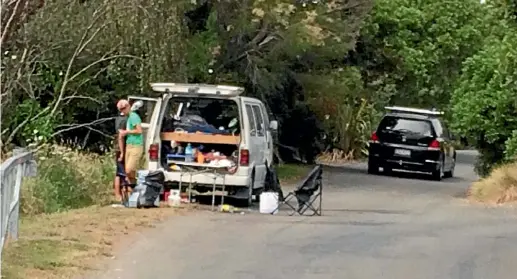  ??  ?? A freedom camper spreads his gear across the road.