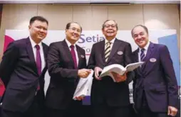  ??  ?? From left: SP Setia executive vice president & CFO Choy Kah Yew, Khor, chairman Tan Sri Wan Mohd Zahid, deputy president & COO Datuk Wong Tuck Wai at the press conference after the EGM yesterday.