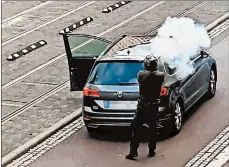  ?? ANDREAS SPLETT/ATV-STUDIO HALLE ?? A man fires a weapon in Halle, eastern Germany, on Wednesday. Police said two people were shot dead.