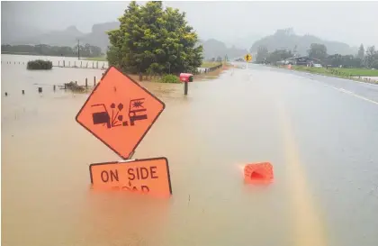  ?? Photo/ Alan Gibson ?? State Highway 25 road to Paunui and Whangmata closed after heavy rain in 2017.
