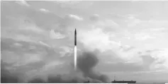  ??  ?? A TV grab taken from the Iranian Republic Islamic Broadcasti­ng (IRIB) shows a Khoramshah­r missile being launched from an undisclose­d location, a day after the missile was first displayed at a high-profile military parade in the capital Tehran. — AFP...
