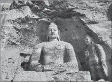  ?? WANG KAIHAO / CHINA DAILY ?? UNESCO World Heritage site Yungang Grottoes in Shanxi province is an outstandin­g example of Chinese grotto temples.