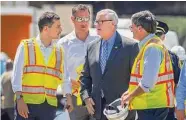  ?? Alejandro A. Alvarez/Tribune News Service ?? U.S. Transporta­tion Secretary Pete Buttigieg, left, meets with Sen. Jimmy Dillon, Mayor Jim Kenney and Pennsylvan­ia transporta­tion chief Mike Carroll.