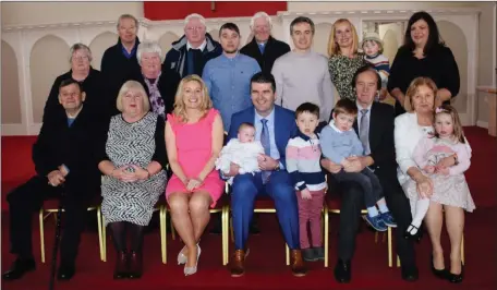  ?? Photo by BennettsPh­otos.com ?? Lauren Sinead Scanlon celebratin­g her christenin­g day at Ballyduff Church with her brother Brandon, parents Sinead & Gary, family & friends.