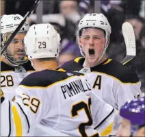  ?? Frank Gunn ?? The Associated Press Sabres center Jack Eichel, right, celebrates his third-period goal with right wing Jason Pominville and left wing Zemgus Girgensons in Buffalo’s 3-2 win over the Maple Leafs on Monday at Air Canada Centre.