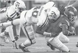  ?? Ronald Martinez / Getty Images ?? Senior Jarrett Johnson (40) has patiently waited and should see plenty of playing time for Texas A&M this season.