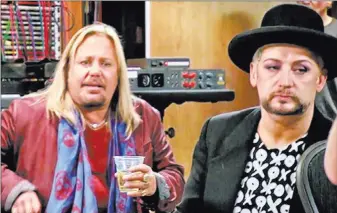  ??  ?? Vince Neil, left, and Boy George compete on NBC’S “The New Celebrity Apprentice.” NBC