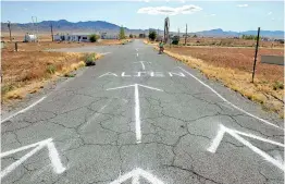  ??  ?? Entrance markings at the 2019 Alienstock Festival on Route 375 — also known as the "Extraterre­strial Highway" — in Nevada, north of Area 51. (AFP)