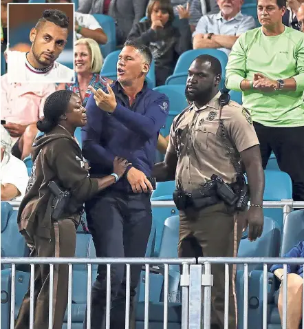  ?? — AFP ?? Heckler: Police remove a spectator after he argued with Nick Kyrgios (inset) of Australia in his match against Dusan Lajovic of Serbia in the Miami Open at the Miami Gardens, Florida, on Sunday.