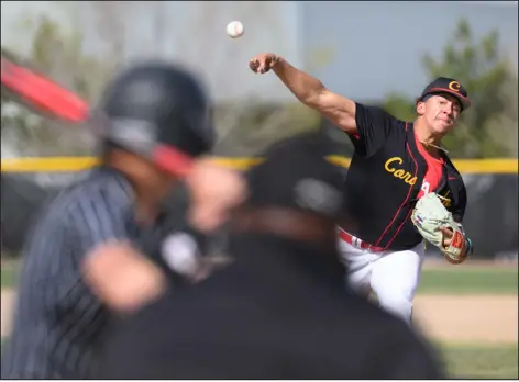  ?? PHOTOS BY MARK REIS — SPECIAL TO THE DENVER POST ?? Coronado High School pitcher Trey Gregory- Alford throws during a game at Harrison High School on Tuesday in Colorado Springs. Coronado won 9- 1.