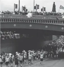  ?? DANIEL BEREHULAK/GETTY IMAGES ?? Who knew? If you want to be effective with your cheers, according to the results of a recent study, use the runner’s name and urge him or her to go “as fast as you can.”