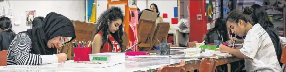  ?? JULIA COOK/SPECIAL TO THE GUARDIAN ?? Confederat­ion Centre art students work on their projects during a recent class. Their creations will be included in an art exhibit as part of “Light Up the Dark! An Arts Education Celebratio­n.From left are Nawal Khailil, Anna Alkhouri, Vivian Huang and Marilia Vanderlei.