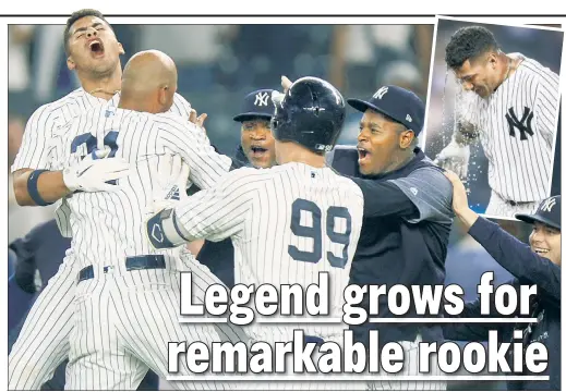  ??  ?? GLEY’ TO GO! Gleyber Torres (left) celebrates with teammates after hitting the game-winning RBI single during the 10th inning of the Yankees’ 6-5 victory over the Astros. Torres also got a Gatorade bath for his late-game heroics.