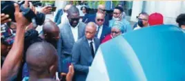  ?? ?? (Middle) Jelani Aliyu, director-general of National Automotive Design & Developmen­t Council inspecting the Hyundai Kona EV in front of the Lagos Interconti­nental Hotel,Victoria Island at the end of the event held last week Thursday.