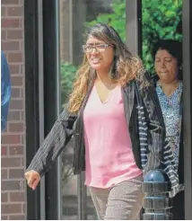  ?? BEV HORNE/ DAILY HERALD ?? Tina Jones leaves the DuPage County courthouse Thursday in Wheaton after pleading not guilty to solicitati­on of murder for hire and attempted murder.