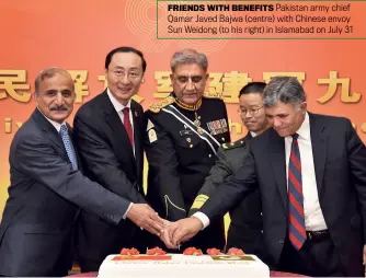  ??  ?? FRIENDS WITH BENEFITS Pakistan army chief Qamar Javed Bajwa (centre) with Chinese envoy Sun Weidong (to his right) in Islamabad on July 31