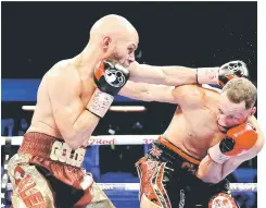  ??  ?? James DeGale (right) in action with Caleb Truax. — Reuters photo