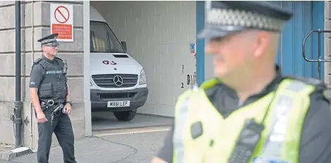  ?? Picture: PA. ?? Police at Greenock Sheriff Court, where a teenager appeared in relation to Alesha Macphail’s death.