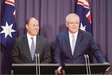  ?? REUTERS PIC ?? The new Australian Prime Minister Scott Morrison (right) and his deputy, Josh Frydenberg, at a news conference in Canberra yesterday.