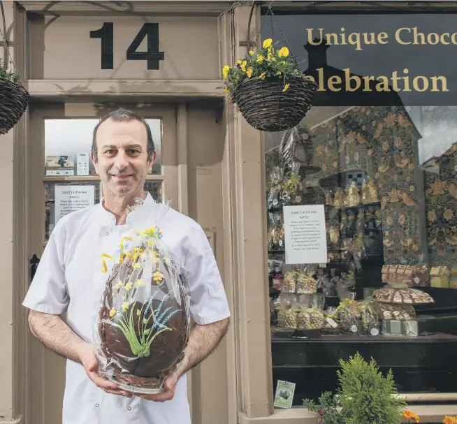  ?? ?? MELTING MOMENTS:
Main picture left, owner
Ian Peacock outside Birdgate Chocolatie­rs, Pickering, with a giant Easter egg; inset opposite, bottom left and bottom right, other seasonal treats available at the artisan chocolate shop; bottom centre, Peter and Fran Guppy, owners of Guppy’s Chocolates, in the village of Sheriff Hutton, near York.