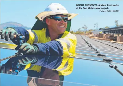  ?? BRIGHT PROSPECTS: Andrew Peet works at the Sun Metals solar project.
Picture: EVAN MORGAN ??