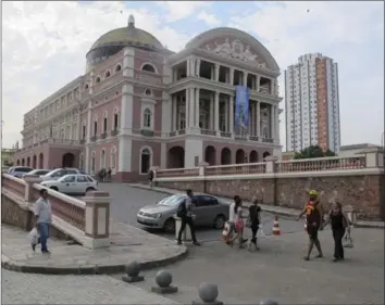  ??  ?? The Teatro Amazonas in Manaus, Brazil. The theatre was built during the rubber boom in the 19th century. Today it offers several shows a year and is one of the main tourist attraction­s in the area.