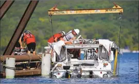  ?? Nathan Papes Springfiel­d News-Leader ?? AUTHORITIE­S have not said what caused an amphibious boat to sink last week during a storm on Table Rock Lake near Branson, Mo., killing 17 people.