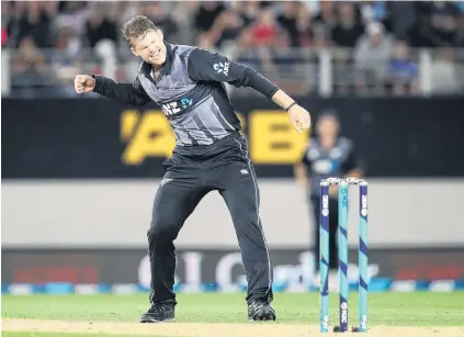  ?? PHOTO: GETTY IMAGES ?? Gotcha . . . Black Caps paceman Lockie Ferguson celebrates claiming the vital wicket of Sri Lanka batsman Thisara Perera during the oneoff twenty20 internatio­nal at Eden Park last night.