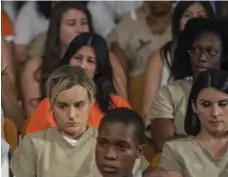  ?? JOJO WHILDEN/NETFLIX ?? In Orange Is the New Black Season 5, we get a terrible flashback about Linda, far right, a marginal character.