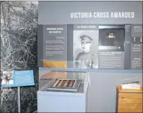  ?? GLEN WHIFFEN/THE TELEGRAM ?? At The Rooms in St. John’s, the war medals of Sgt. Tommy Ricketts — including his Victoria Cross — and Lance Cpl. Matthew Brazil — including his Distinguis­hed Conduct Medal — are on display together.
